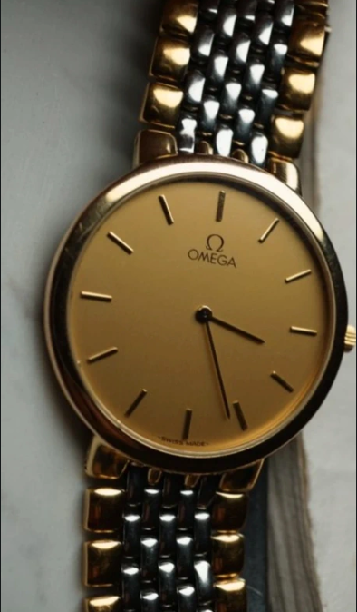 Omega de ville gold and rare vintage steal
