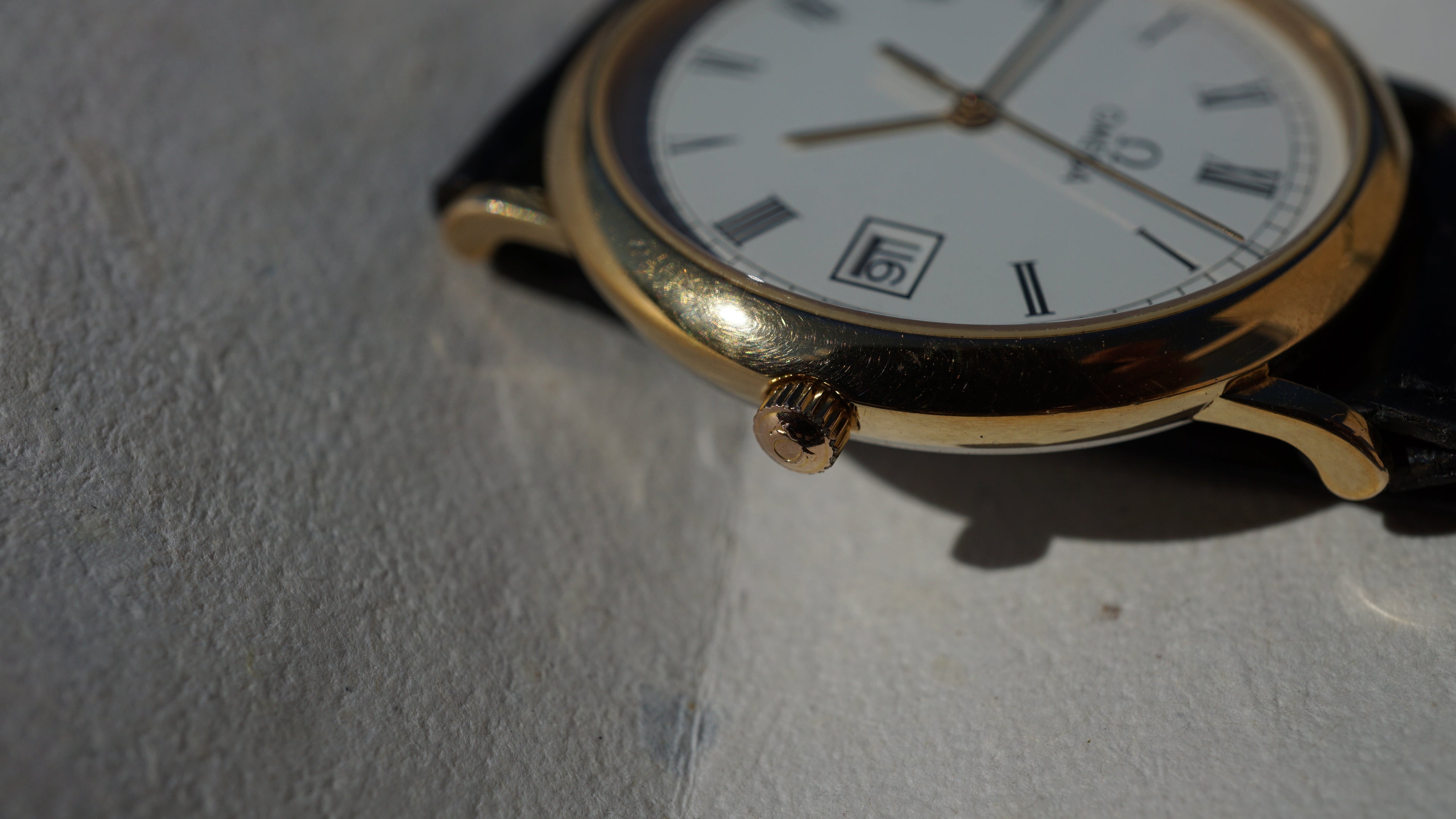 Omega De Ville Quartz Date roman dial