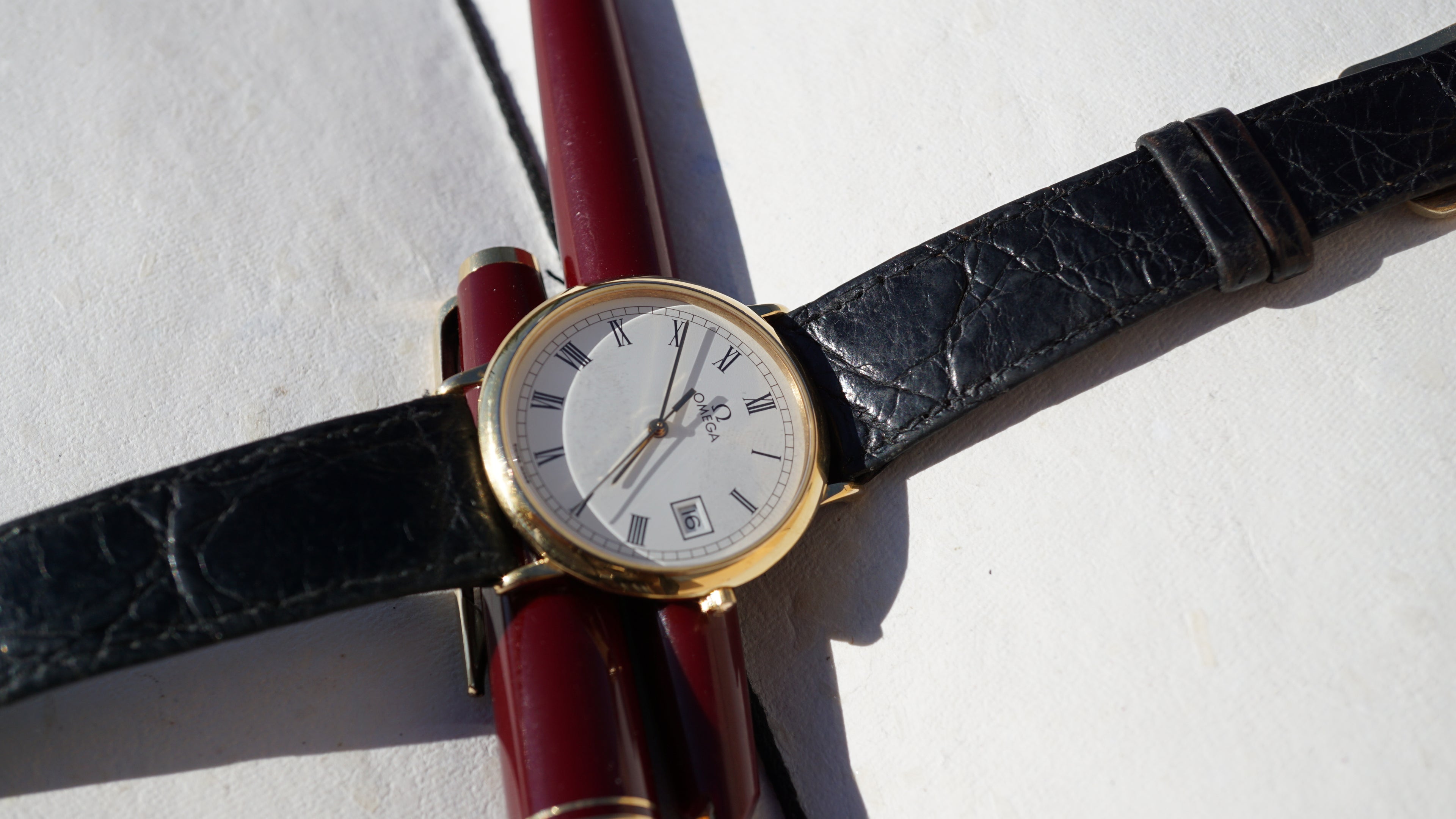 Omega De Ville Quartz Date roman dial