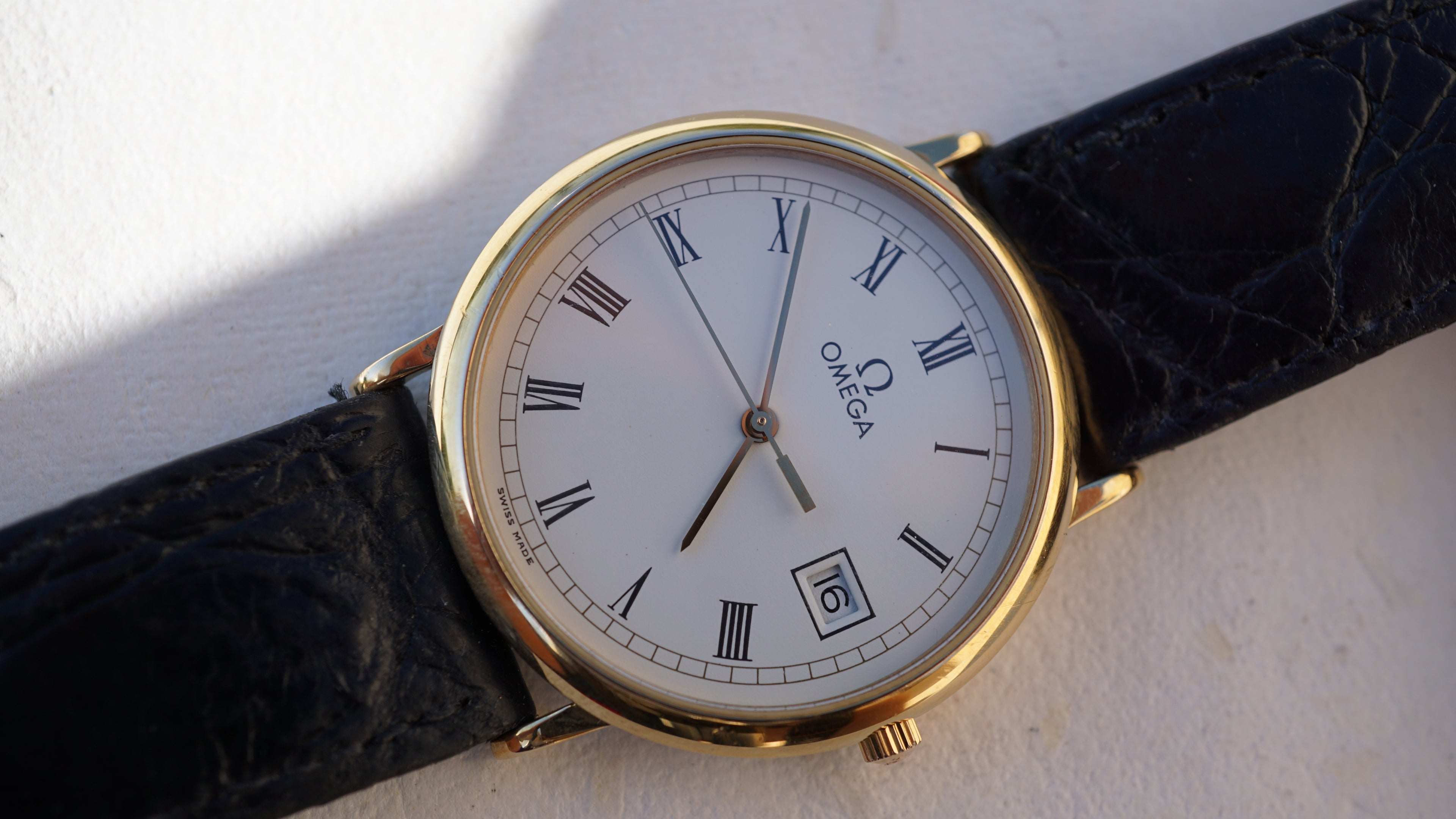 Omega De Ville Quartz Date roman dial
