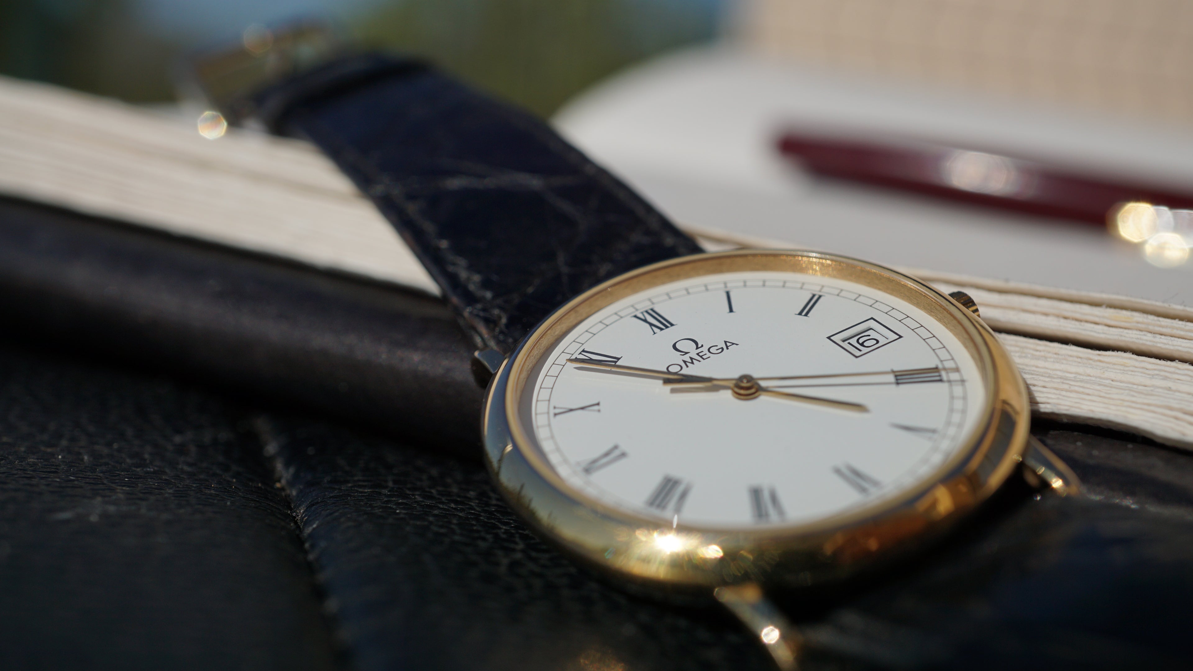 Omega De Ville Quartz Date roman dial