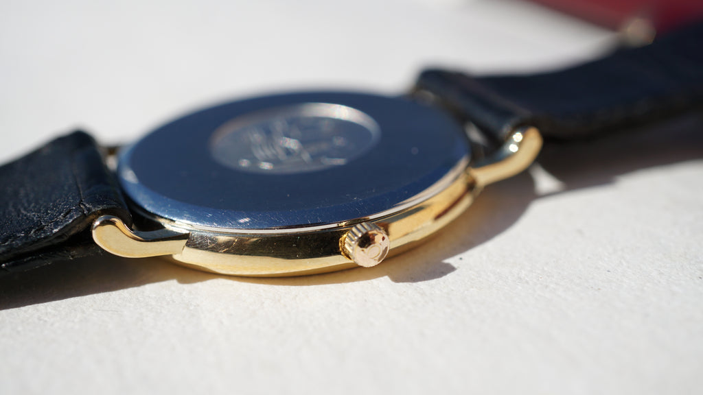 Omega De Ville Quartz Date roman dial