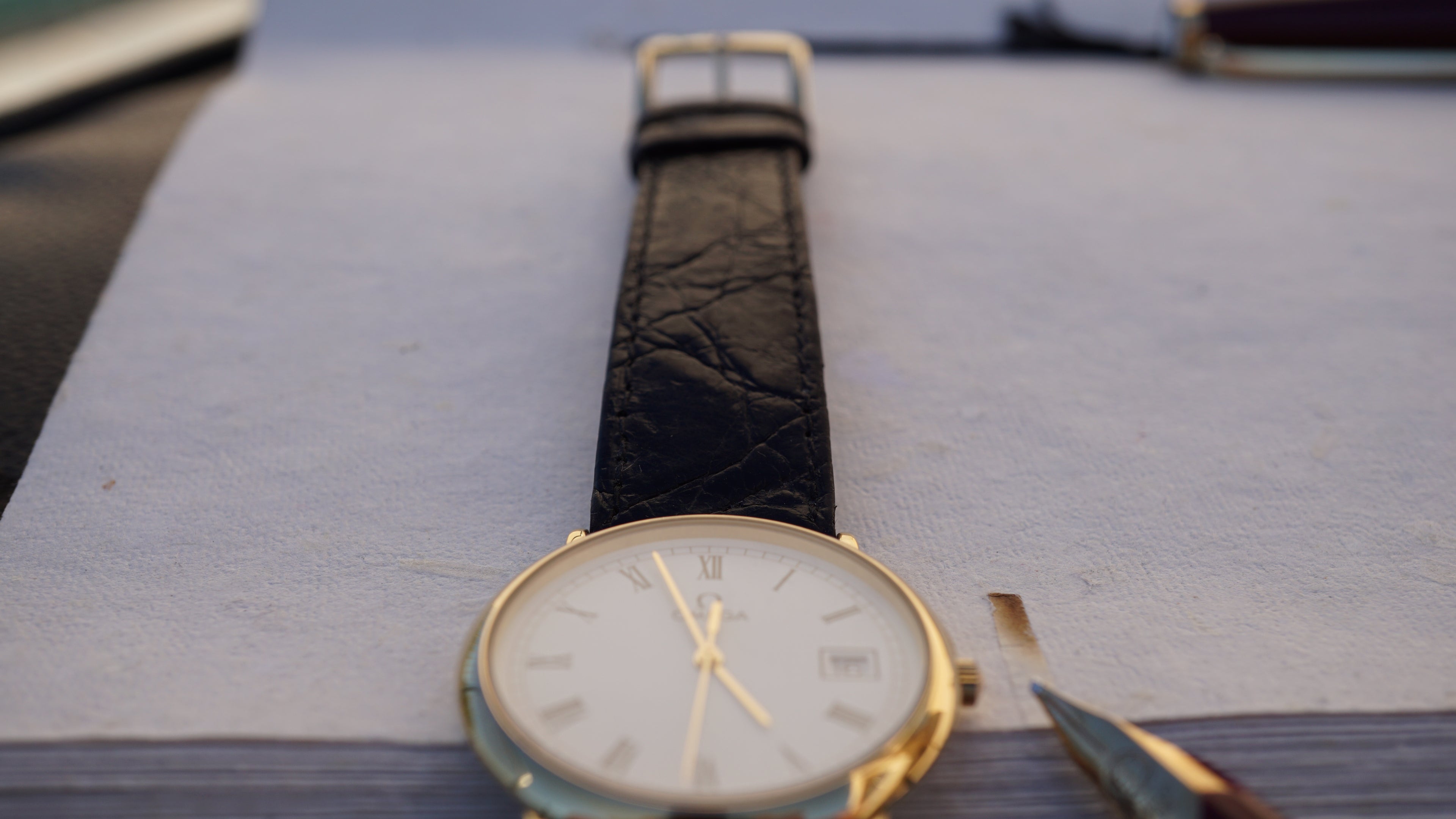 Omega De Ville Quartz Date roman dial