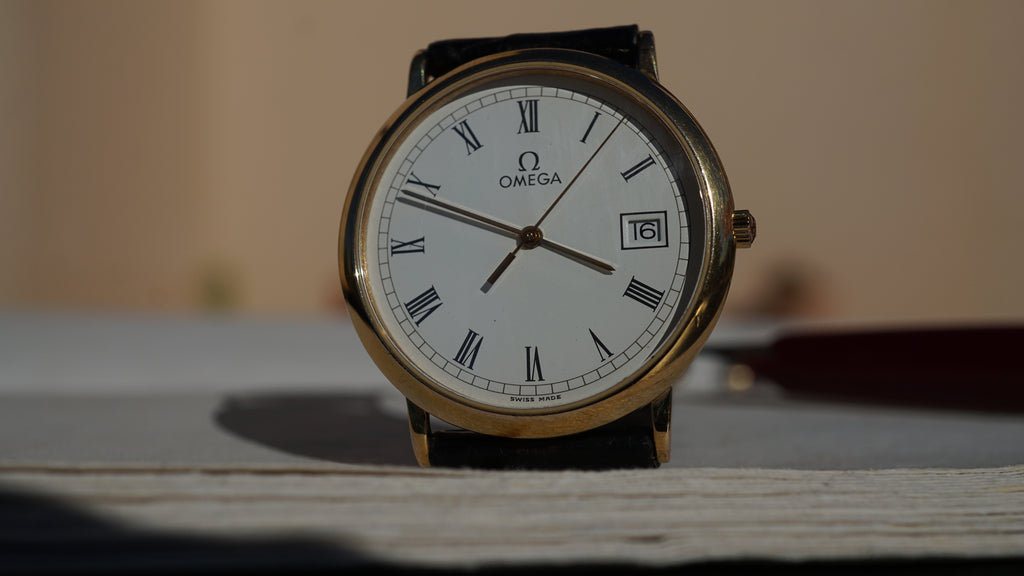 Omega De Ville Quartz Date roman dial