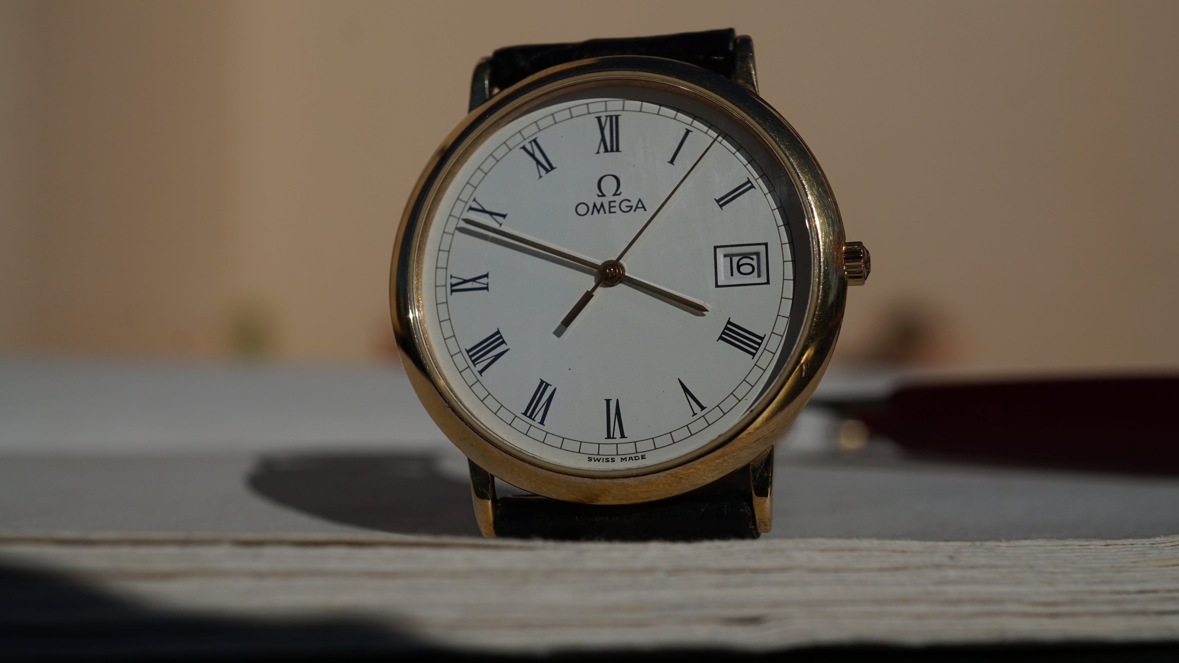 Omega De Ville Quartz Date roman dial