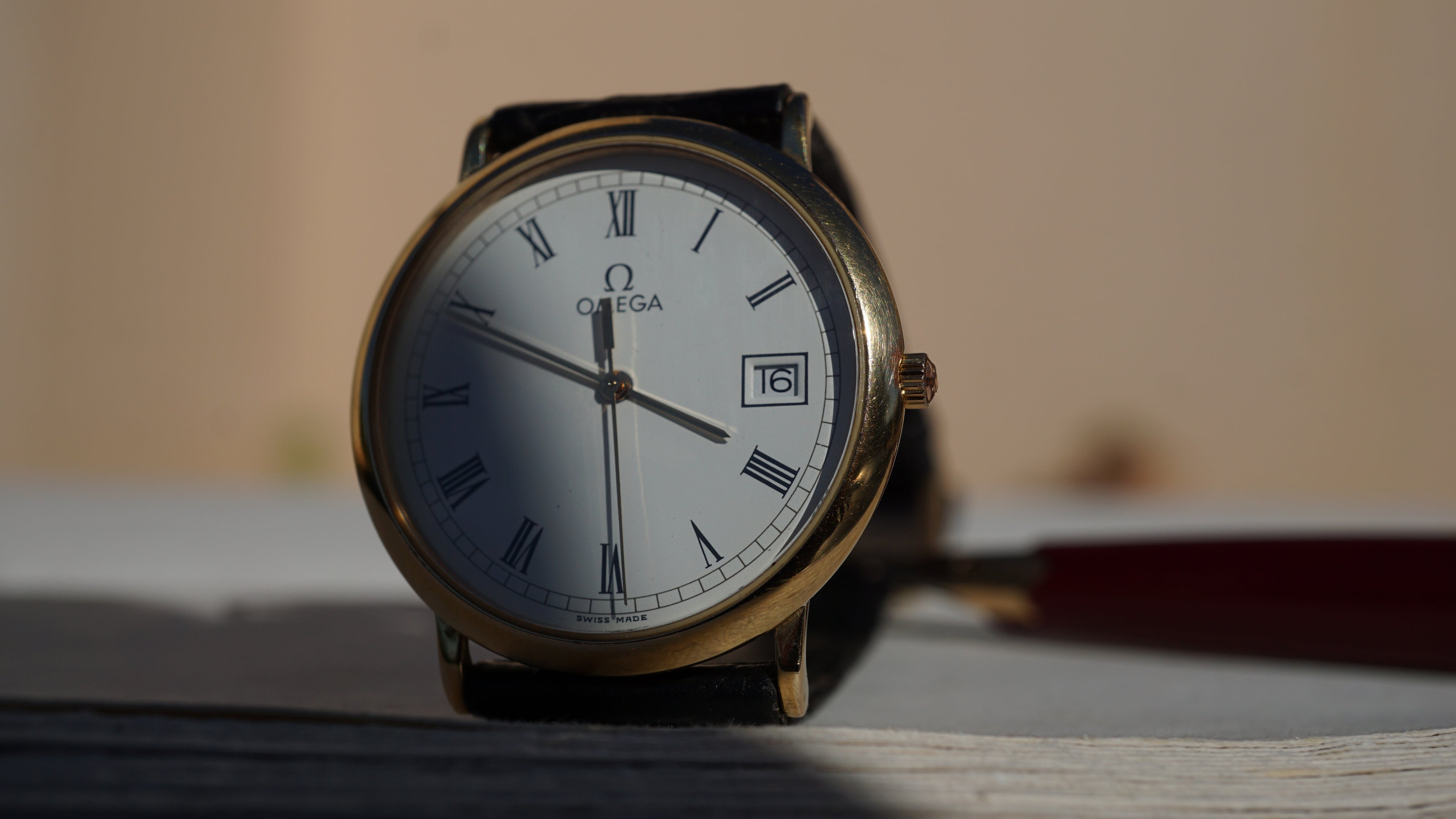Omega De Ville Quartz Date roman dial