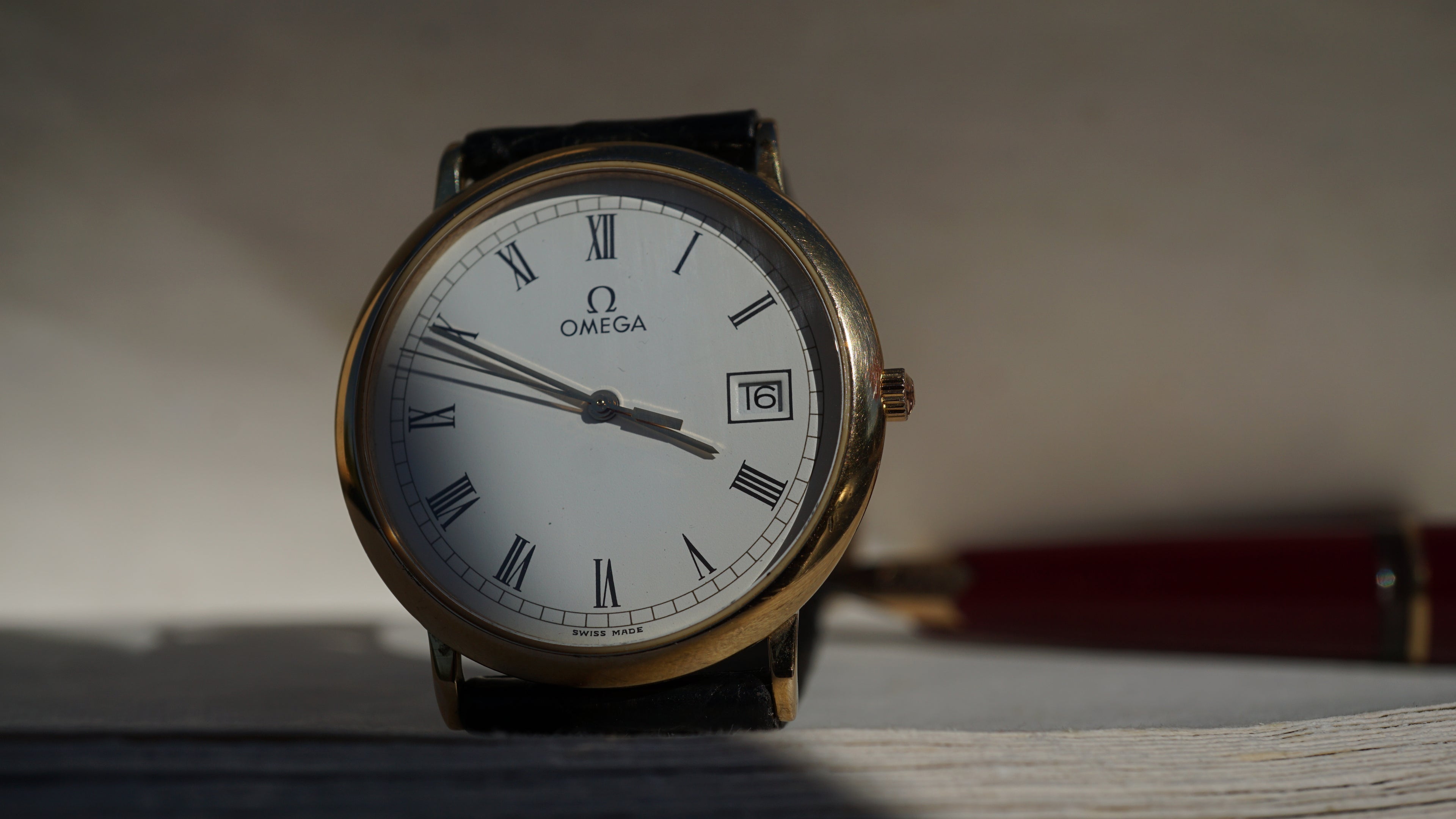 Omega De Ville Quartz Date roman dial