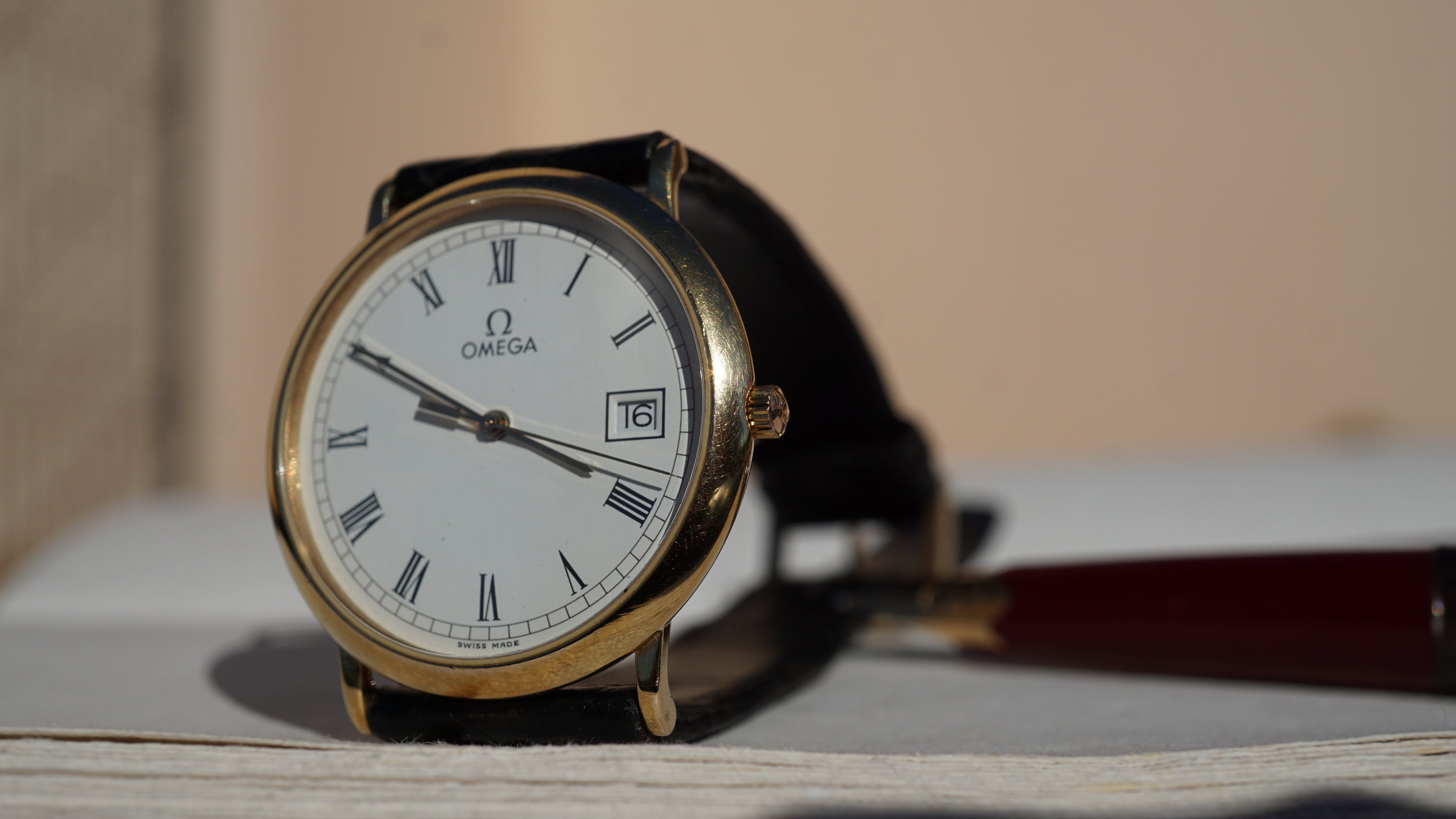 Omega De Ville Quartz Date roman dial