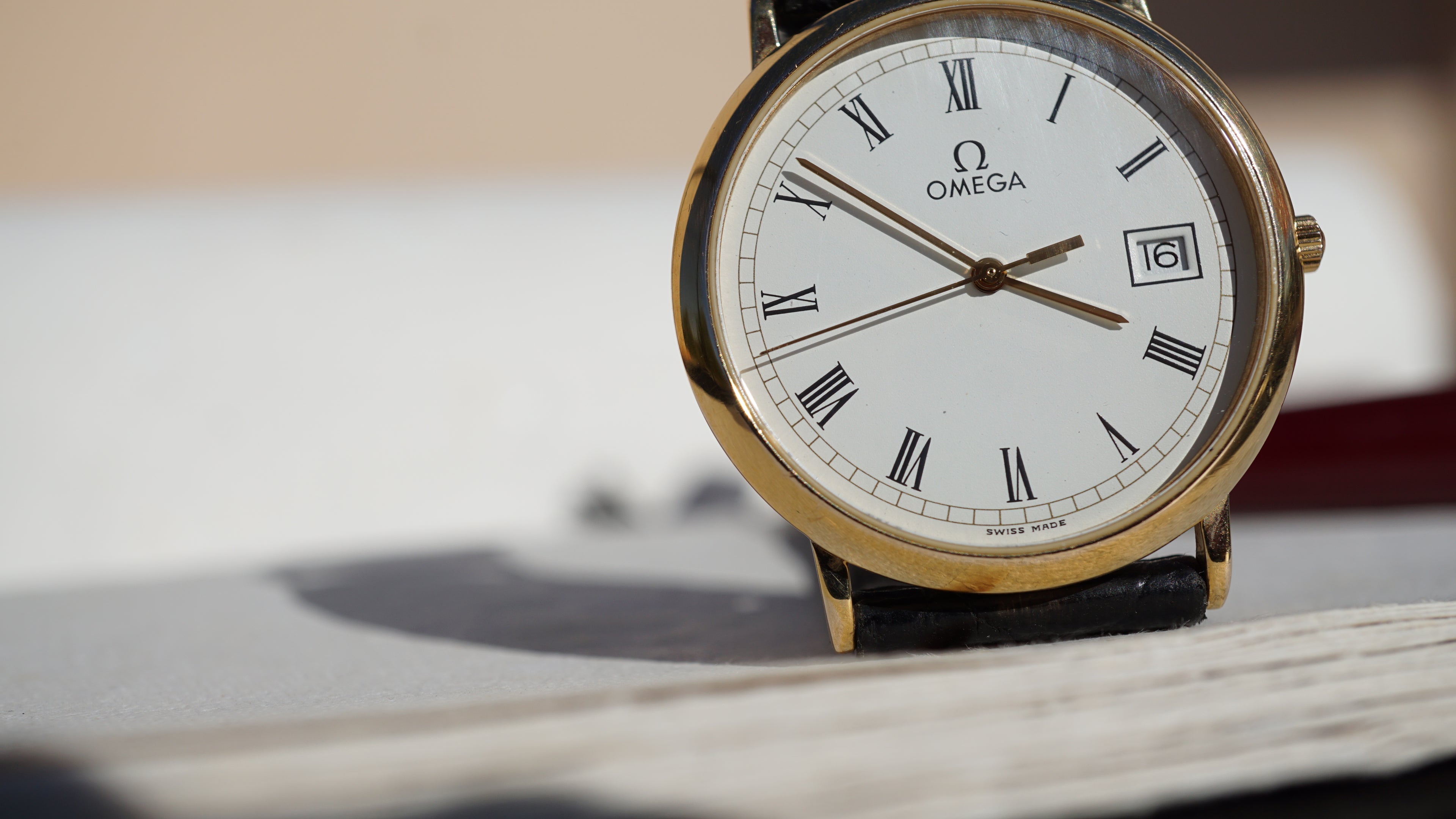 Omega De Ville Quartz Date roman dial