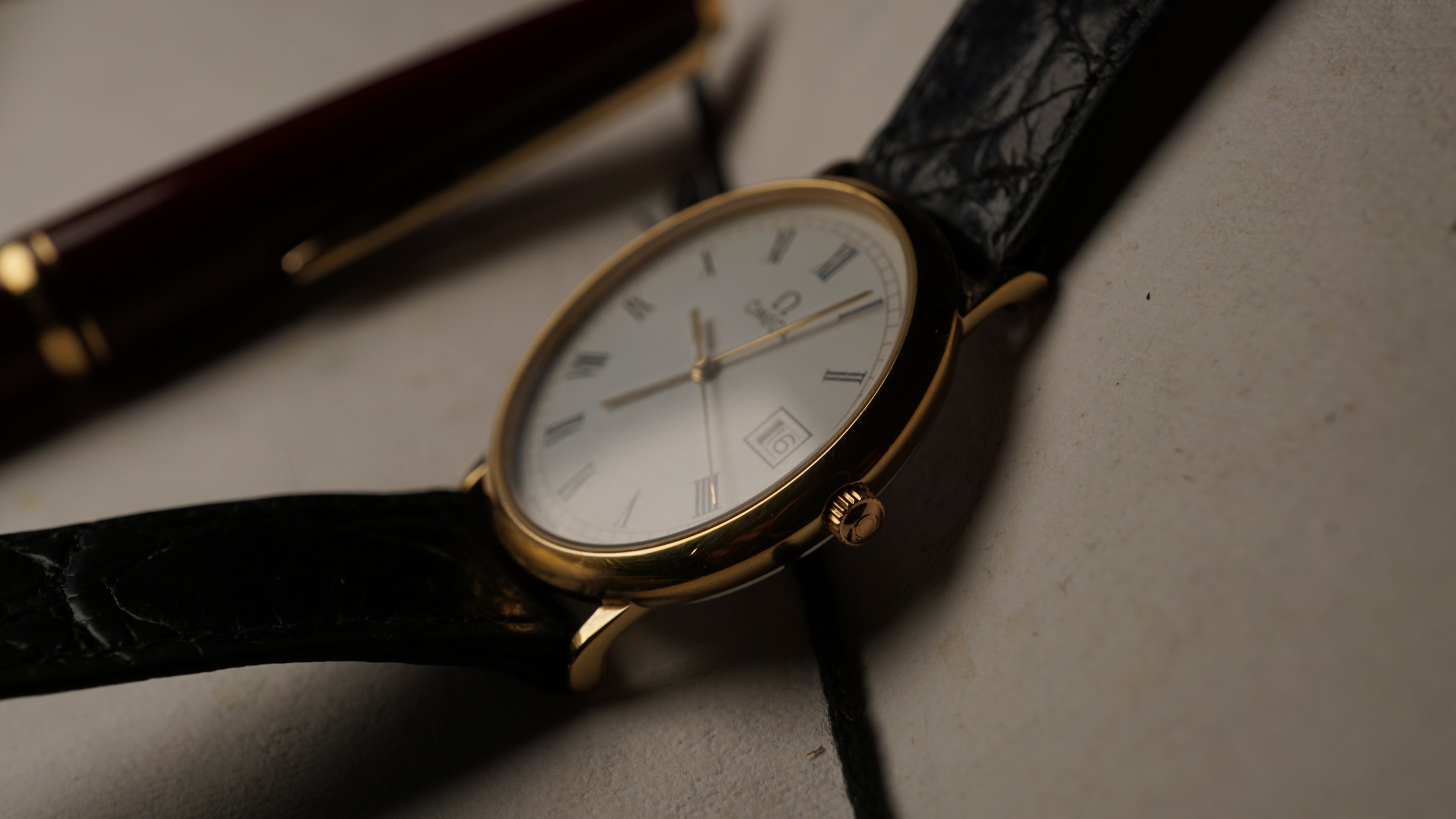 Omega De Ville Quartz Date roman dial