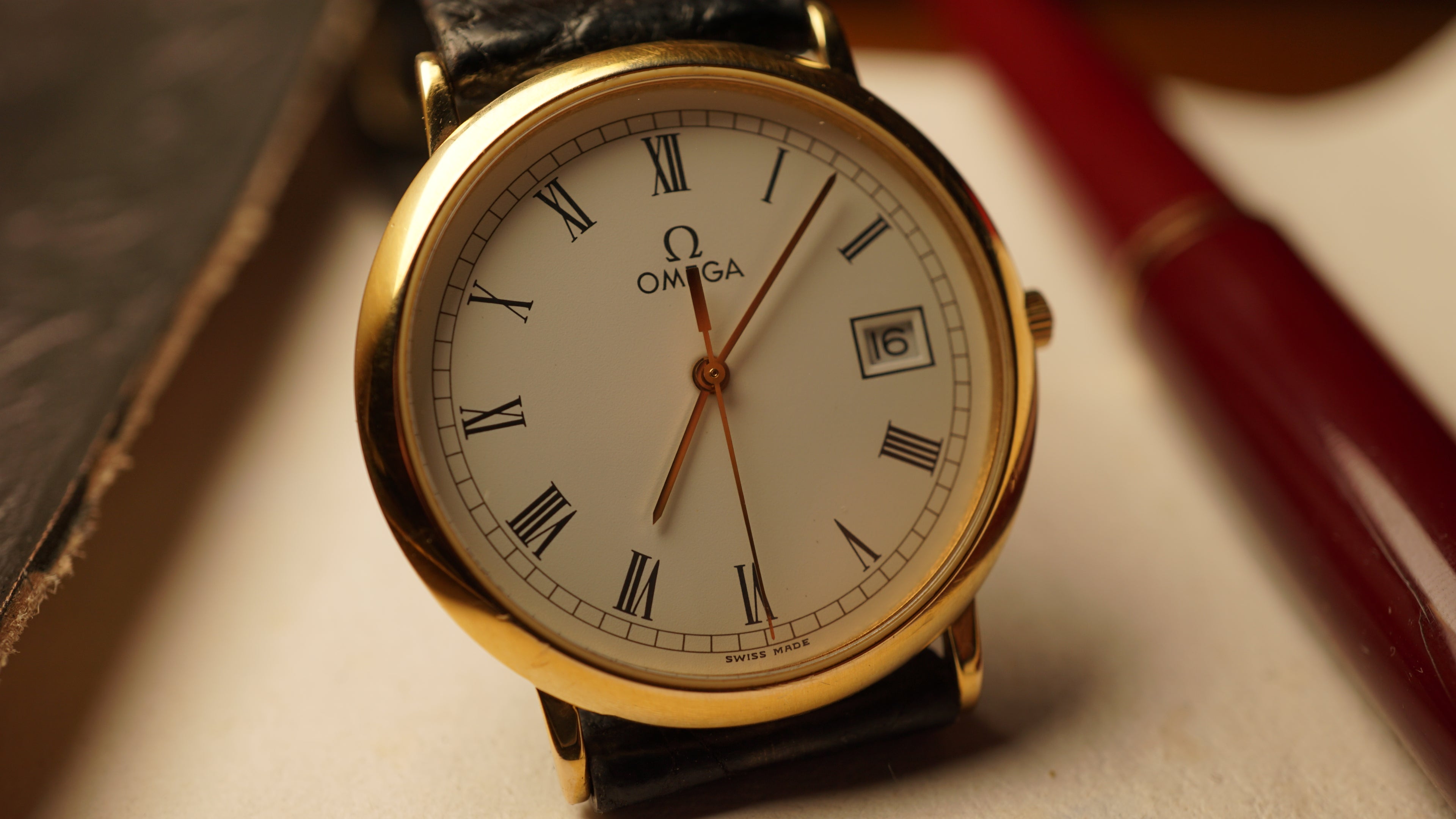 Omega De Ville Quartz Date roman dial