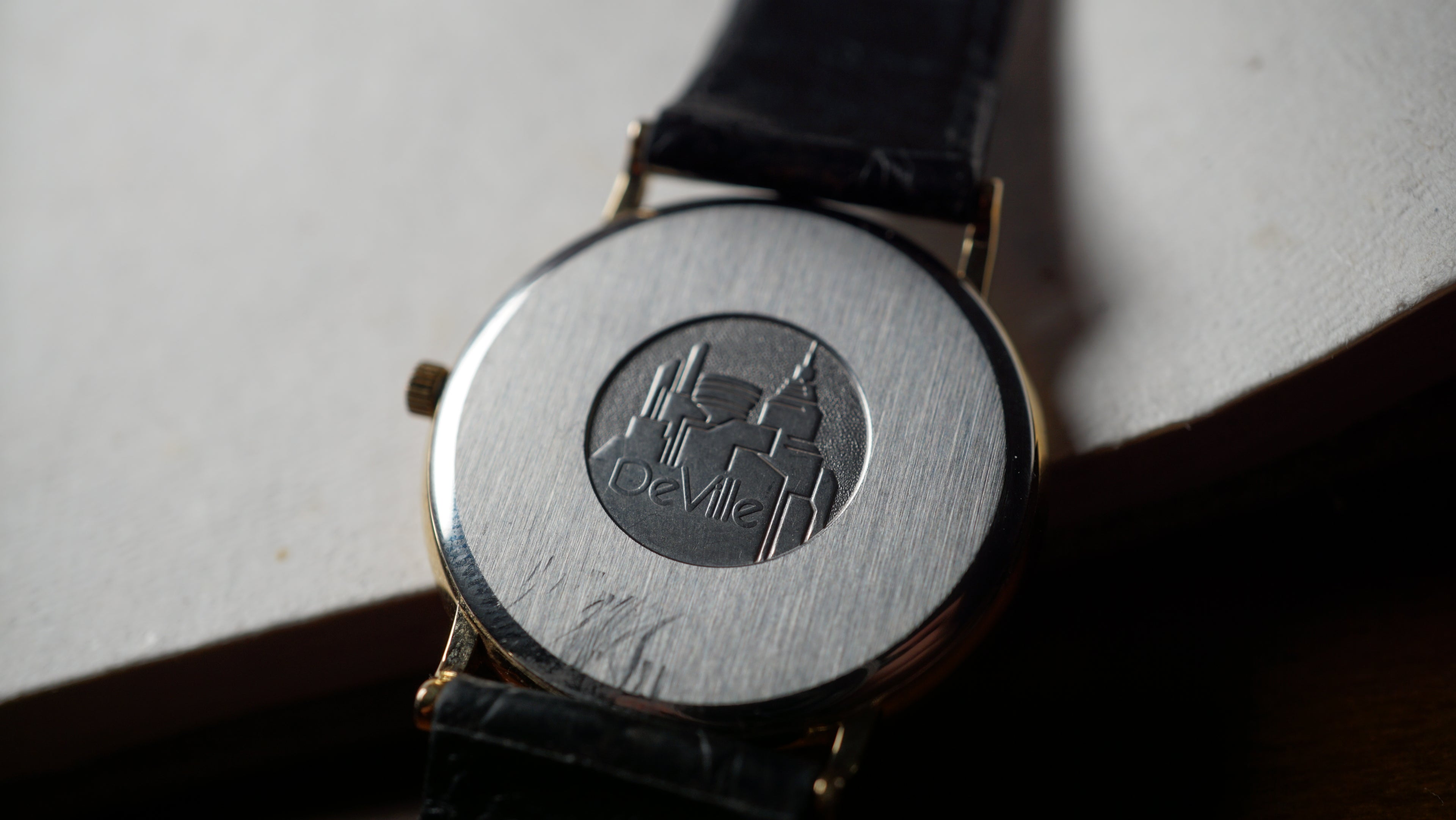 Omega De Ville Quartz Date roman dial