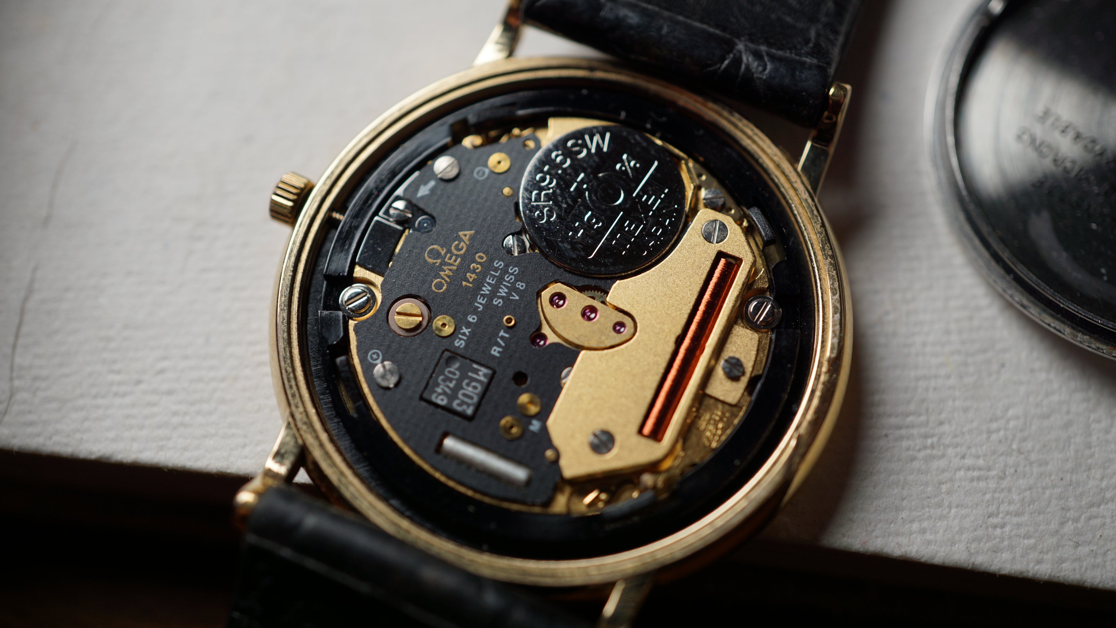 Omega De Ville Quartz Date roman dial