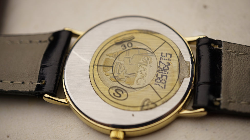 Omega De Ville Quartz Date – Full Set with Rare Original  roman numeral dial Fama Elegance